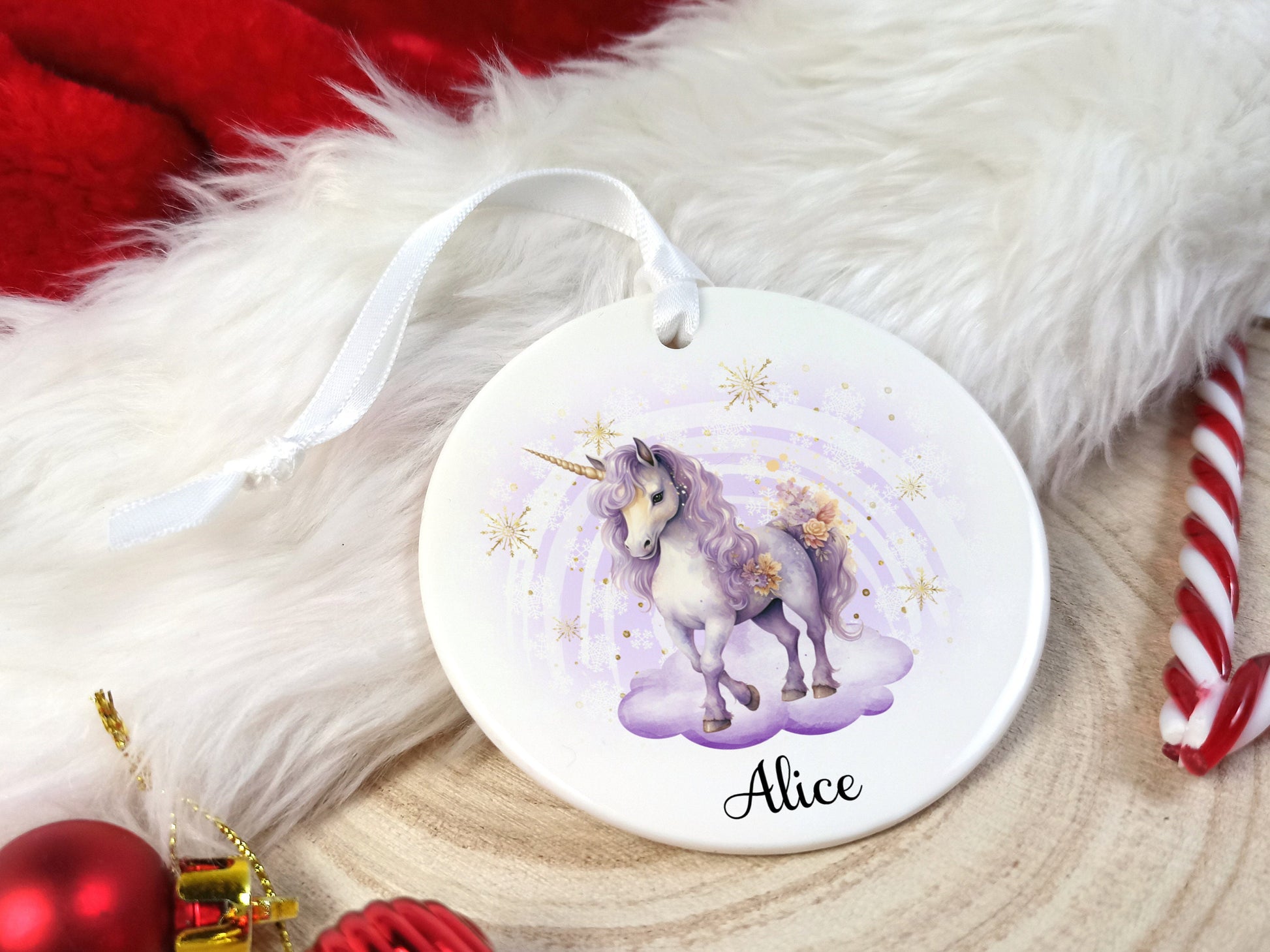 Personalised Unicorn-themed ornament on a festive background